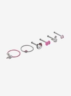 three pairs of hello kitty earring and ring set in silver, pink, and black