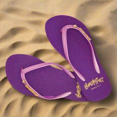 Built for the beach, Styled for the Sun, Meet your new dance partner. Beachyfeet® are the summer essential for your suitcase. The women's collection comes with a slimmer strap and features the brand's soft and slinky footbed. Pasión Púrpura is a gorgeous deep purple beach basic design. The sole print features Art Deco detailing and the strap is embellished with the brand's gold BeachyFeet® pin. A bold and contrasting model, these flip flops can be paired with ease together with deeper summer tones. Gold Stainless Steel Beachyfeet® Emblem Lightweight & Comfortable Non Slip & Water Resistant Heat Resistant & Durable Vegan Friendly Slimmer 10mm Strap Textured Footbed Flexible Rubber Sole Debossed BeachyFeet® Logo imprint on bottom sole Adjustable Purple Flip Flops For Summer, Purple Summer Sandals For The Beach, Purple Summer Beach Sandals, Trendy Purple Sandals For The Beach, Purple Flip Flops For Spring Beach Outings, Purple Sandals For Beach Vacation, Adjustable Purple Sandals For Beach, Purple Sandals For Vacation And Beach Season, Spring Purple Flip Flops For Beach