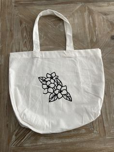 This reusable tote bag is perfect for every occasion! Size: 13.5" x 13.5" x 4" White Softback Canvas Bag For Everyday Use, White Canvas Tote Bag With Removable Pouch, Casual Reusable Tote Shoulder Bag, Trendy White Reusable Bags, Large White Bags For Everyday Use, Large White Bag For Everyday Use, Reusable Tote Canvas Bag For Daily Use, Large White Canvas Bag For Everyday Use, Recyclable Canvas Tote Bag For Everyday Use