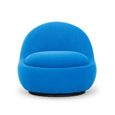 a blue chair sitting on top of a white floor