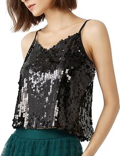 Look your best in this Sparking Sequin Cami Sleeveless Top. The eye-catching sequins bring a unique shimmering look that's sure to turn heads. Show off your personal style with this must-have statement piece. 100% Polyester Imported Pull On closure Hand Wash Only Brand Size Dress Bust Waist Hip XS 0-2 31-32.5'' 23-24'' 31-34" S 4-6 33-35'' 25-26'' 35-37" M 6-12 35-36'' 27-28'' 38-39" L 12-14 38-40'' 29-31'' 40-42" XL 14-16 40-42'' 33.5-36'' 44-46" Glamorous Tank Top For Party Season, Black Party Top With Contrast Sequin, Glamorous Party Camisole Tank Top, Black Party Tops With Contrast Sequin, Fitted Black Sequin Fabric For Summer, Summer Party Vest Sleeveless Blouse, Sleeveless Summer Party Vest, Black Sequin Fabric For Party Season, Glamorous Spring Party Camisole