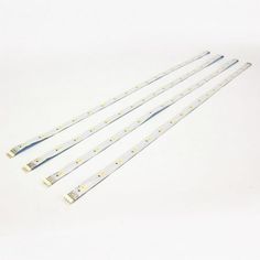 four white leds on a white background