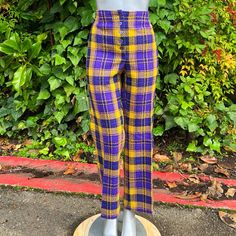 1960s Acrylic Plaid Made In Japan High Rise Flares Fabulous Pair Of Acrylic Plaid High Rise Flares Circa 1960s In Like New Vintage Condition! Gorgeous Purple And Yellow Colorway, Front Button Fly Closure, And Figure Flattering High Rise Silhouette. In Excellent, Appearing Unworn Vintage Condition! Best Fit A L/Xl (34/35" Waist). See Measurements For Exact Fit. Measurements Waist: 17.5" Hip: 22.5" Rise: 12" Inseam: 28" Length: 40" Retro Fitted Purple Bottoms, Fitted Retro Purple Bottoms, Purple And Yellow, Yellow Plaid, Vintage Pants, Purple Gold, New Vintage, Made In Japan, Pant Jumpsuit