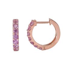 This finely handcrafted huggie hoop dangle earrings is composed of 14K solid gold and AAA quality round brilliant cut natural real Purple Sapphire gemstones. This classic earring features a secure hinged closure for the ease of taking them on and off. Huggie Dimensions: outer diameter approximately 11.5mm inner diameter approximately 8.25mm hoop width 1.90mm post thickness 0.75mm post length 6.5mm Backing Type: Clip in Wire Metal Finish: High Shine Polish This design is currently available in 14 Rainbow Gemstones, Purple Sapphire, Classic Earrings, Black Rhodium, Huggie Hoop Earrings, Single Earring, Jewelry Earrings Hoops, Jewelry Gift Box, Unique Earrings