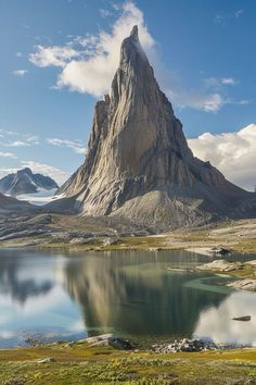 a mountain with a lake in front of it