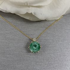 Solitaire Necklace, Round Green Paraiba Pendant, Diamond Necklace, 14K Yellow Gold With 18" Cable Chain, Infinity Jewelers USA #6892 #GiftForHer #RoundStonePendant #GraduationGift #SolitaireNecklace #GreenParaiba #14kYellowGold #DiamondNecklace #GreenStoneNecklace #6892 #CableChain Light Green Diamond Necklace, Emerald Necklace In Brilliant Cut, Green Brilliant Cut Necklace For May Birthstone, Gia Certified Green Necklace For Formal Occasions, Green Gia Certified Fine Jewelry Necklace, Formal Green Gia Certified Necklace, Green Emerald Necklace With Brilliant Cut For May Birthstone, Green Fine Jewelry Necklace With Prong Setting, Green Gemstone Necklace With Round Cut