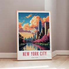 a poster is sitting on the floor in front of a wall with a cityscape