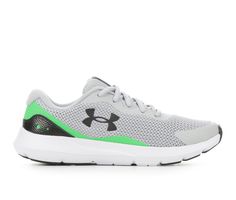 the under armour grey and green running shoe is available in sizes ranging from todd to adult