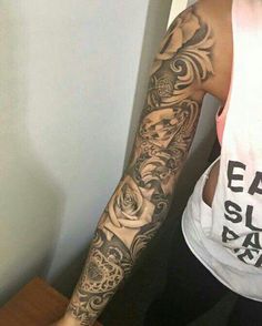 a man with a tattoo on his arm