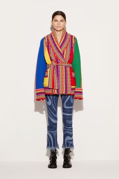 This knitted cardigan captures Pucci's penchant for vibrant hues through its rainbow-style colourblock design. It's crafted from wool to a relaxed silhouette and is finished with an appliqué at the front pocket bearing logo lettering alongside Capri's Faraglioni. Bright red, bright yellow, royal blue, bright pink Shawl lapels Long sleeves Self-tie waist belt Patch side pockets with logo appliqué Striped ribbed-knit trims Relaxed fit 100% wool Dry clean only Style ID: 4UKQ034U963A22 Model is 177cm and wears size XS Made from a midweight fabric Bearing Logo, Pink Shawl, Rainbow Style, Creative Clothing, Blanket Sweater, Rainbow Fashion, Tie Front Cardigan, Yellow Ties, Knitted Cardigan