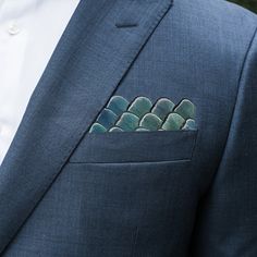 Product Details | A completely bespoke feather pocket square made to fit any pocket size. Wear it parallel to your pocket, or with one corner creating a "peak" popping out. Control how much of the feather panel shows by pushing it deeper into the pocket. The Granite pairs nicely with the Dunbar, Green Pond, Colleton, Big Sky, Scarab and Edisto bow ties. Pheasant feathers. No dyes are used, giving each pocket square a unique coloring. Feathers are all-natural and sustainably sourced. Grosgrain fa Black Tie Optional Wedding, Creative Black Tie, Green Pocket Square, Green Pond, Black Tie Optional, Blue Bow Tie, Pond Design, Pheasant Feathers, Blues And Greens