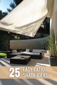 an outdoor patio area with furniture and shade sails over the seating area is featured in this article