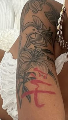 Women Arm Tattoo Ideas Simple, Thigh Flower Tattoo Black Women, Lily Flower Tattoos Black Women, Flower Tattoos Dark Skin, Cherry Blossom Tattoo On Dark Skin, Sleeve Tattoos Black Women, Darkskin Tattoos Girl, Arm Sleeve Tattoos For Women