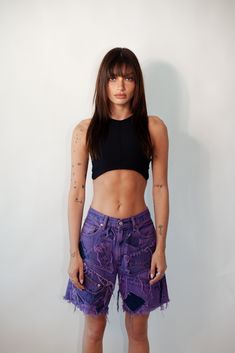 The Knotwtr Purple Patched Denim Shorts are crafted from top-quality denim, offering an ideal blend of comfort, breathability, and style. Each pair is meticulously handcrafted from repurposed vintage jeans, guaranteeing that every piece is truly one-of-a-kind.With their vibrant purple patches, these shorts make a bold statement while promoting sustainability. Enjoy the confidence of a customized look that reflects your individuality, all while supporting eco-friendly fashion with our stylish Kno Customized Denim, Patched Denim, Repurposed Denim, Recycled Jeans, Repurposed Vintage, Vibrant Purple, Denim Patches, Eco Friendly Fashion, Athletic Apparel