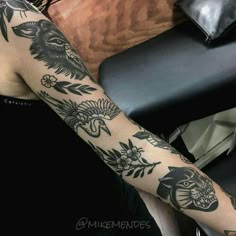 a person with a tattoo on their arm