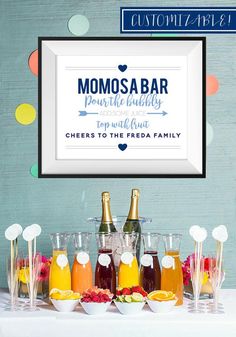 a table topped with bottles and glasses filled with fruit next to a framed sign that says momsa bar