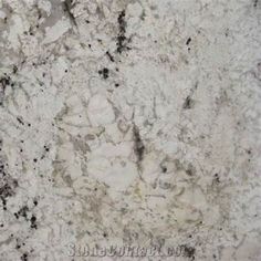 a close up view of a marble counter top with black and white speckles