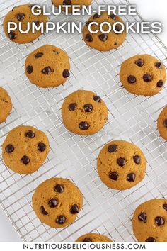 gluten free pumpkin cookies cooling on a wire rack with chocolate chips in the middle