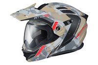 the helmet is designed to look like it has been painted in grey, red and white