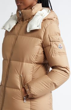 Crafted of water-repellent fabric and equipped with a removable hood, this channel-quilted puffer with lofty down fill delivers signature Moncler warmth and protection from the elements. Two-way front-zip closure Stand collar; removable hood Adjustable snap elastic cuffs Front zip pockets; sleeve snap-flap pocket Lined, with 90% down, 10% feather fill (Moldova) 100% polyester Hand wash, dry flat Made in Moldova Designer Clothing Down Puffer Jacket, Water Repellent Fabric, Light Beige, Puffer Jacket, Flap Pocket, Stand Collar, Repellent, Water Repellent, Zip Pockets