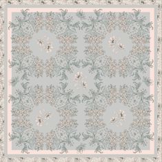 a blue and white floral design on a light gray background with pink trimmings