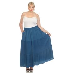 Elevate your fashion game with this flowy and effortlessly chic skirt. This maxi skirt from White Mark boasts a pleated design that adds texture, movement, and a touch of sophistication to your look. Dress it up or down as this skirt is incredibly versatile. Pair it with a tucked in blouse and heels for a sophisticated look or go for a more relaxed vibe with a tucked in tee and sandals and pair it with a jacket on chilly days. It’s perfect for various occasions and style preferences. Flowy Tiered Lined Maxi Skirt, Flowy Tiered Maxi Skirt With Lining, Flowy Pleated Full Maxi Skirt, Flowy Solid Color Gathered Maxi Skirt, Casual Flowy Tiered Pleated Skirt, Casual Pleated Maxi Dress With Flowy Skirt, Lined Tiered Maxi Skirt, Pleated Relaxed Fit Tiered Maxi Skirt, Solid Ruffled Flowy Maxi Skirt