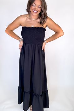 Be ready to shine in our Sunsational Maxi Dress! This flowy, strapless boho beauty will have you feeling effortlessly stylish at any occasion. Show off your shoulders in smocked detail and be the center of attention (in the best way!) Fit: She is wearing her true size medium. Fits true to size. If in between sizes, size down.