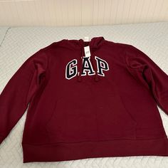 Super Comfortable Maroon Hoodie Brand New With Tags Sporty Gap Hoodie For Fall, Gap Hooded Hoodie For Fall, Gap Hooded Top With Drawstring, Gap Hooded Top With Drawstring Hood, Gap Tops With Drawstring Hood For Fall, Casual Gap Hooded Hoodie, Casual Hooded Gap Hoodie, Gap Fleece Hoodie For Fall, Gap Sweatshirt With Adjustable Hood For Fall