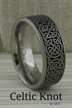 Celtic Knot Wedding Ring in Titanium @ Unique Celtic Wedding Rings Engraved Titanium Wedding Jewelry, Engraved Titanium Jewelry For Weddings, Wedding Engraved Titanium Jewelry, Symbolic Etched Engraved Wedding Ring, Symbolic Etched Wedding Ring, Silver Laser Engraved Jewelry For Wedding, Knot Wedding Ring, Celtic Knot Wedding Ring, Celtic Knot Wedding