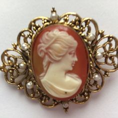 Vintage Brooch. Gorgeous Cameo. Gold tone.Faurx Pearl. Made in Italy in 1950's.She'll Carved. Excellent Vintage Condition. Mosh Pit, Cameo Jewelry, Vintage Stuff, Vintage Brooch, Vintage Brooches, Antique Jewelry, Brooch Pin, Etsy Accessories, In Italy