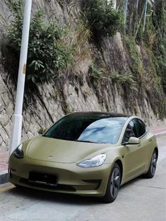 an electric car parked on the side of the road