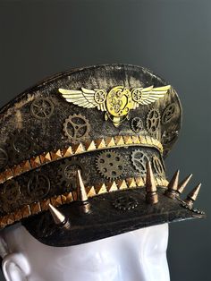 Our captain hat boasts an authentic steampunk aesthetic. Intricate gears, cogs, and spike elements adorn the hat, transporting you to an era of innovation and daring feats.


Age Group/Gender - Adult/Unisex

Size/Type - One size fits all adults

Mask Color - Gold Steampunk High Crown Hat For Themed Events, Steampunk High Crown Costume Accessories For Cosplay, Vintage High Crown Costume Hats For Cosplay, Steampunk Top Hat With High Crown For Themed Events, Steampunk High Crown Top Hat For Cosplay, Steampunk High Crown Mini Hat For Themed Events, Punk Style High Crown Hat For Themed Events, Steampunk High Crown Festival Hat, Steampunk Brimmed Costume Hat For Cosplay