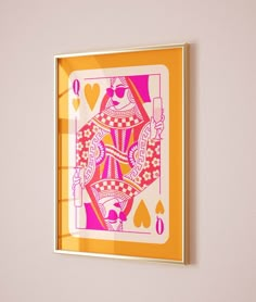 an ace playing card hangs on the wall