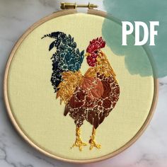 a cross stitch pattern with an image of a rooster