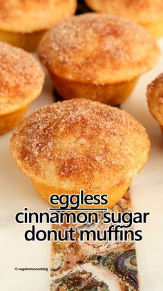 cinnamon sugar donut muffins on a plate with the words, eggless cinnamon sugar donut muffins