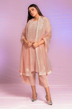 Powder pink plain straight pleated kurta. Paired with a matching pleated palazzo. Comes along with a dupatta with floral embroidered border.
Components: 3
Pattern: Placement Embroidery
Type Of Work: Floral
Neckline: Round Neck
Sleeve Type: Half Sleeves
Fabric: Pleated satin polyester organza, 70% viscose and 30% nylon
Color: Pink
Other Details: 
Length:
Kurta: 42 Inches
Palazzo: 35 Inches
Dupatta: 2.5 mtr
Occasion: Puja - Aza Fashions Kurta Set With Dupatta, Placement Embroidery, Pink Plain, Types Of Work, Embroidered Border, Embroidered Dupatta, Straight Kurta, Kurta Set, Powder Pink