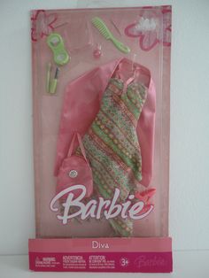 a barbie doll in its package with accessories