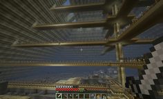 the inside of a building with lots of stairs and windows on it, in minecraft