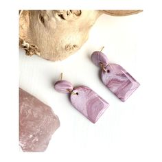 Rose Quartz inspired Polymer Clay Earrings Each pair of Earrings is handmade and unique. Handcrafted rose quartz inspired Earrings measure 20mm (w) x 45mm (L).  CARE FOR YOUR EARRINGS: ⦁ Avoid showering or swimming with your earrings on, and don't get them in touch with perfume, deodorant, hairspray, etc. ⦁ Treat your earrings with care as the small and intricate parts on the earrings may come off if treated roughly. Polymer clay is very strong but needs removing carefully from the card and your Earrings Handmade Dangle, Handcrafted Earrings, Quartz Rose, Polymer Clay Earrings, Deodorant, Clay Earrings, Rose Quartz, Handmade Natural, Favorite Jewelry