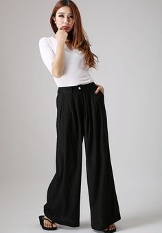 "A go-to staple in your wardrobe--These black linen pants made in linen fabric give you timeless and classic style, plus are flattering and easy to wear. The black palazzo pants is designed in loose style with two pockets, you can wear it as a casual pant, you'll feel modern, free and chic dressing them up or down. The wide leg pants is casual if you wear a shoes without heel, if you wear heels, it will make you taller. ** WIDE LEG PANTS-SLACKS DETAIL** * Made with linen blend fabric, contain li Linen Pants Outfit Spring, Black Linen Pants Outfit Summer, Linen Pants Outfit Summer Casual, Black Linen Pants Outfit, Linen Pants Outfit Summer, Maurices Outfits, Long Linen Pants, Black Trousers Women, Pants Outfit Summer