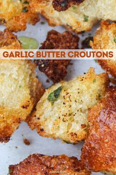 garlic butter croutons on a plate with the words garlic butter croutons