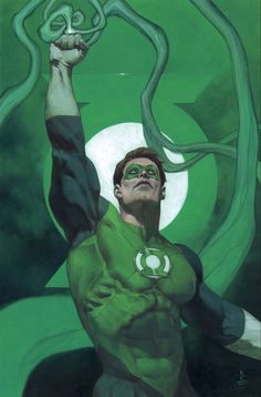 the green lantern is holding his hands up in front of an image of a giant snake