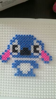 the legos are made to look like an image of stitched in blue and pink