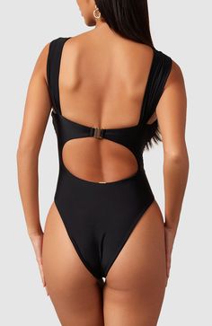 Thoughtfully placed gathers and a center knot create beautiful ruching along the top and straps of this elegant one piece swimsuit. Whether wearing on a yacht or by the pool, this stunner will have you looking and feeling like money. Thick double-lined fabric Gold colored clasp - tarnish and rust resistant High cut at legs Cheeky bottoms One-piece Swimwear With Ruched Back For Sunbathing, Elegant Swimwear With Knotted Straps For Beach, One-piece Swimwear With Knotted Straps For Pool, Elegant Beach Swimwear With Knotted Straps, Ruched One-piece Swimming Bodysuit, One-piece Swimwear With Ruched Back, Ruched Bodysuit For Swimming Beachwear, Solid Color Swimwear With Knotted Straps For Beachwear, One-piece Ruched Bodysuit For Swimming