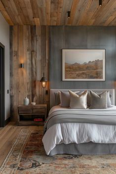 a bedroom with wood paneled walls and a bed in the middle, along with an area rug on the floor