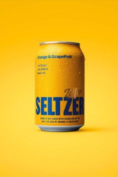 a can of seltzer on a yellow background