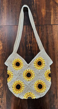 This sunflower bag is perfect to match your sunny sweet vibes for spring and summer. The strap is thick to ensure no breakage and the inside of the bag is lined to make sure nothing falls through. If you like this bag make sure to stick around and check out the new colors coming soon for fall! Spring Crochet Bag With Adjustable Strap, Square Crochet Bag With Adjustable Strap For Beach Season, Cute Handmade Beach Bags, Cute Summer Crochet Bag For Daily Use, Cute Summer Shoulder Bag With Adjustable Strap, Cute Crochet Bag For Daily Summer Use, Summer Yellow Straw Bag With Adjustable Strap, Rectangular Bag With Sunflower Print For Everyday Use, Rectangular Everyday Bag With Sunflower Print