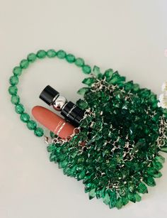 Height of bag: 5.5 inches This beautiful green statement bag is perfect to elevate any look. The beautiful handcrafted crystals and beads add glamor. Green purse green handbag green bead bag green evening purse evening bag Bead Bag, Wedding Bags, Bridal Bag, Green Handbag, Crystal Bags, Green Purse, Statement Bag, Evening Purse, Bag Green