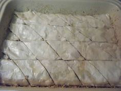 a pan filled with food sitting on top of a counter