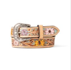 Dress to impress with this girl’s belt from Ariat. This 1 1/4” wide leather strap has scrolling filigree with a pink underlay. It is accented with clear crystals and finished off with a floral engraved antique silver finished buckle. Sunflower Belt, Tooled Sunflower, Girl Tools, Country Belts, Tooled Belt, Leather Tool Belt, Western Buckles, Beautiful Belts, Tool Belt